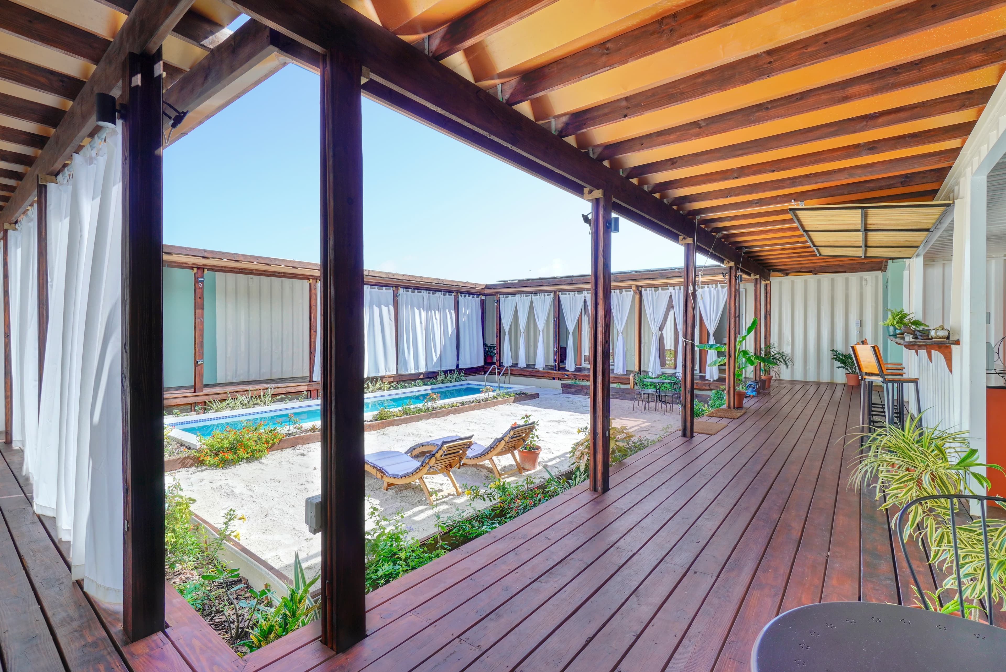 Corten Villa private saltwater pool surrounded by tropical courtyard garden in Grenada