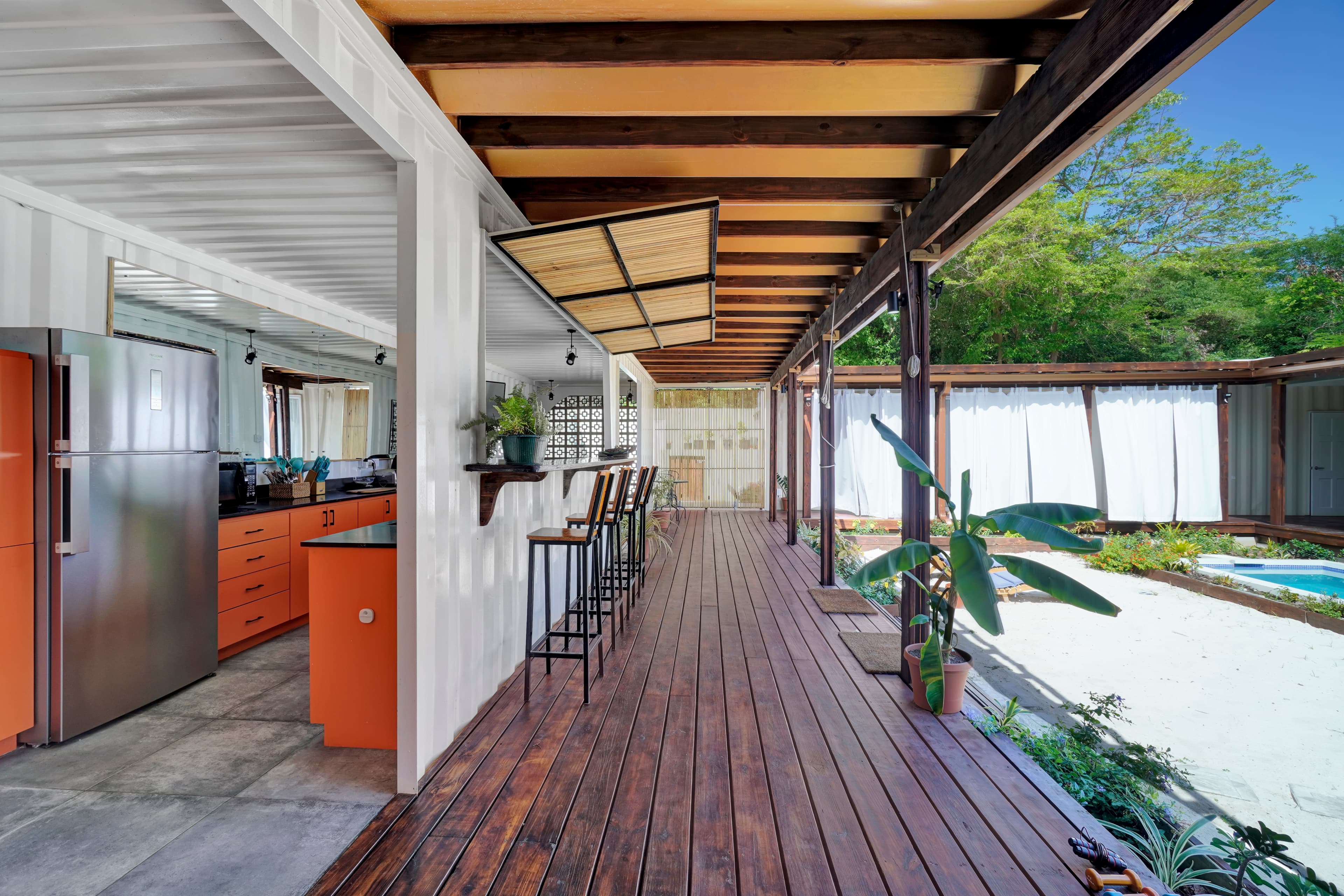 Covered outdoor deck at Corten Villa perfect for al fresco dining in Grenada